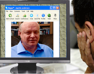 Val&eacute;ry Fradkov works with a client via video conferencing